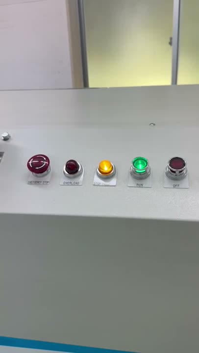 A control panel with five buttons labeled: Emergency Stop, Overload, Aux. Power, Run (lit green), and Off. The Emergency Stop and Overload buttons are red; Aux. Power is yellow; Off is unlit red—perfect for illustrating system workflows in a video or mp4 presentation for Microsoft Teams meetings.